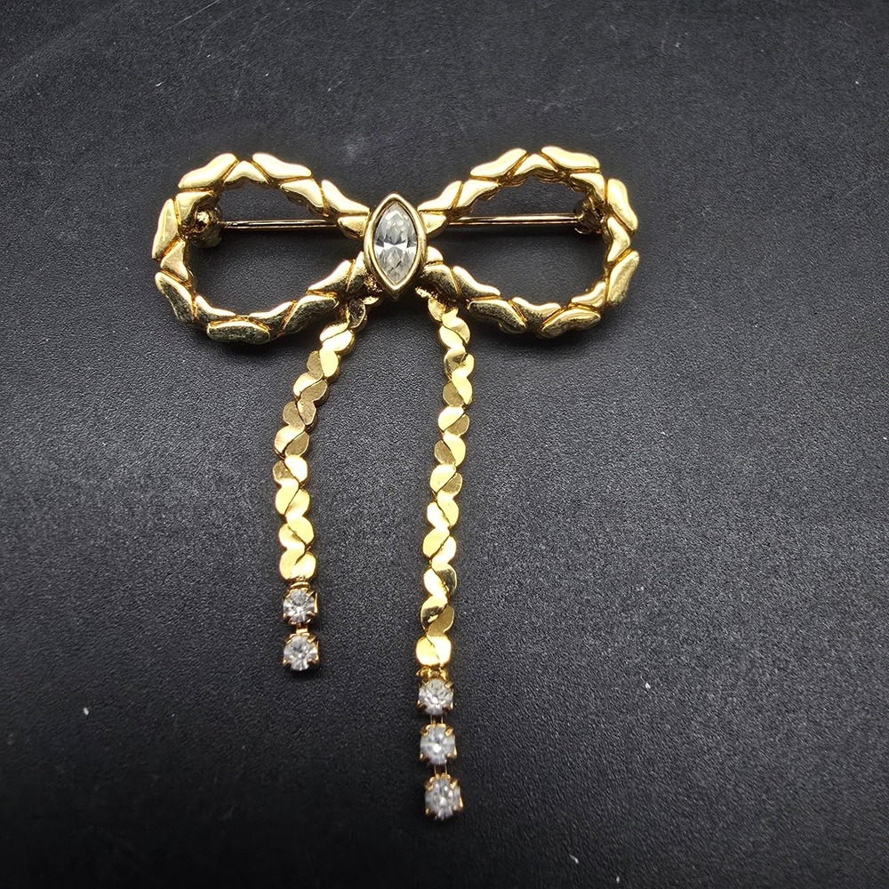 Avon Gold Tone Bow Brooch Rhinestone Accent Vintage Jewelry